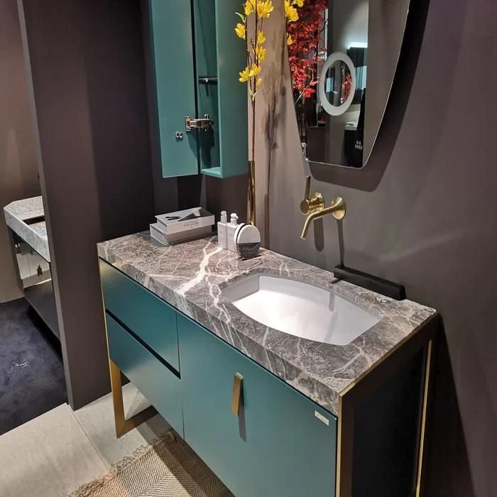 d613802cef293b5d344947edc794d8fd.jpeg-full Elevate your hotel bathrooms with our Luxurious Wooden Hotel Bathroom Vanity, a perfect combination of style, durability, and functionality. Featuring a solid wood frame, an exquisite marble countertop, and an energy-efficient LED mirror, this vanity adds a touch of sophistication to any space. Its moisture-proof design, soft-closing drawers, and generous storage make it ideal for high-traffic hotel use. With a sleek, modern design and effortless installation, this vanity is a statement piece that enhances both the aesthetic and functionality of your hotel bathrooms.