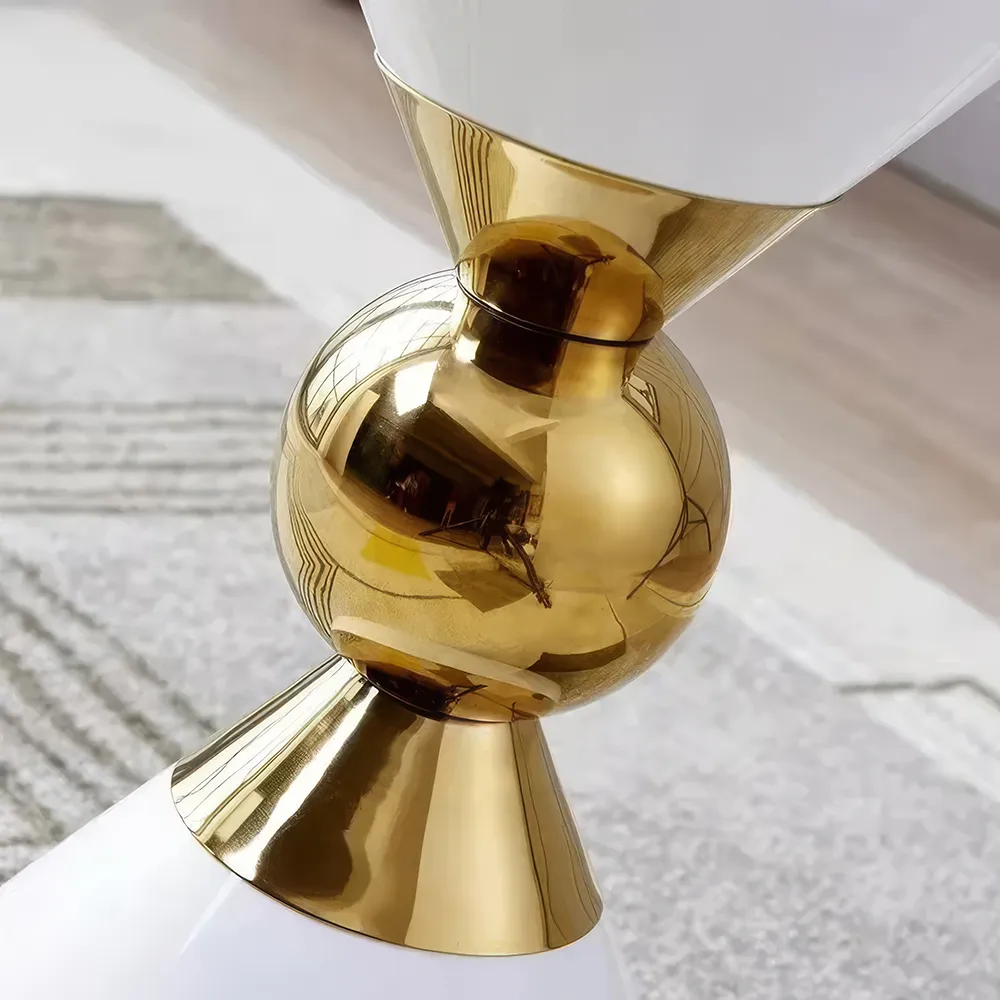 description-image-10-2-35 Introducing our Minimalist Modern Nordic Round Side Table, where elegance meets practicality. With its unique alien-shaped design and sleek, storage-free construction, this table adds a touch of contemporary sophistication to any space. Its sturdy, non-retractable structure ensures stability, while the minimalist aesthetic complements modern interiors. Easy to assemble and versatile, this table is perfect for small spaces and ideal for displaying decorative items or holding everyday essentials. Bring home this statement piece for a stylish, clutter-free living room.