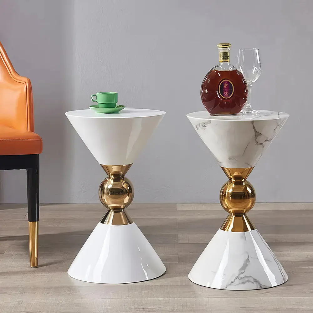 description-image-16-2-41 Introducing our Minimalist Modern Nordic Round Side Table, where elegance meets practicality. With its unique alien-shaped design and sleek, storage-free construction, this table adds a touch of contemporary sophistication to any space. Its sturdy, non-retractable structure ensures stability, while the minimalist aesthetic complements modern interiors. Easy to assemble and versatile, this table is perfect for small spaces and ideal for displaying decorative items or holding everyday essentials. Bring home this statement piece for a stylish, clutter-free living room.