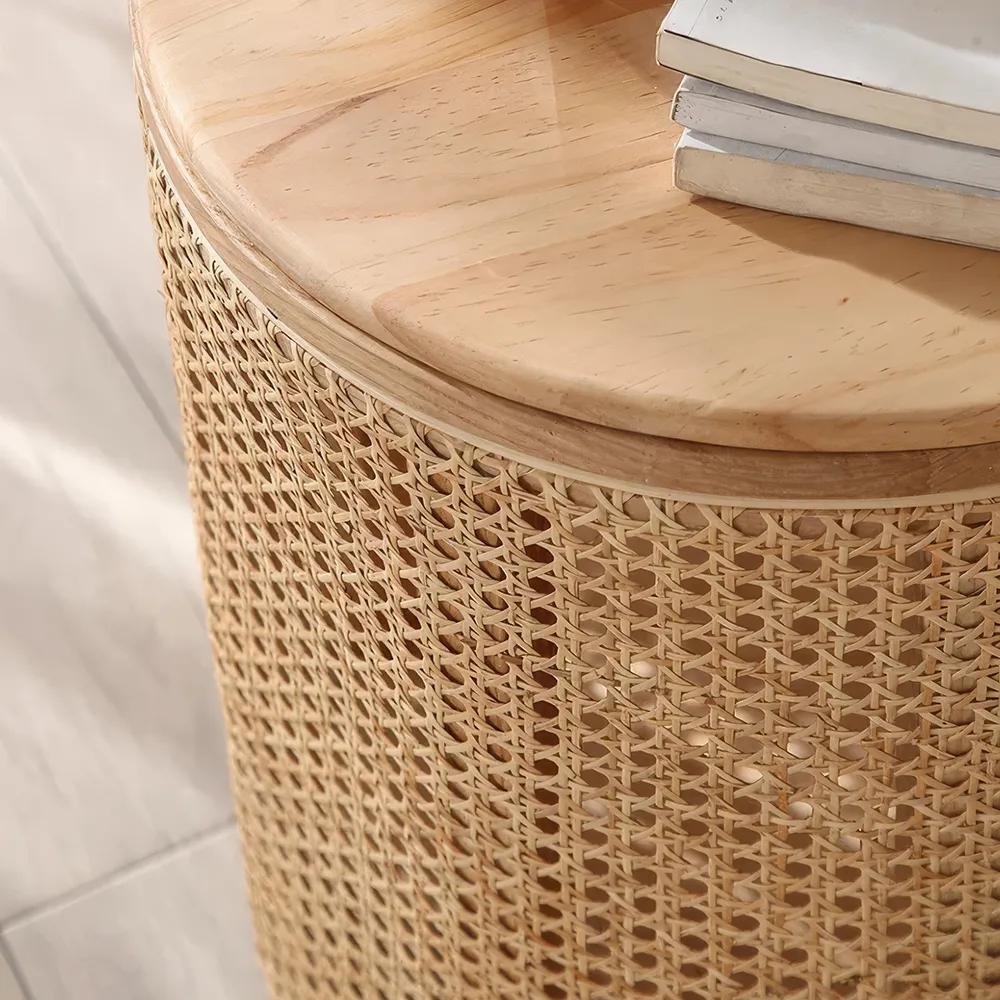 Elevate your home with the Round Rattan and Wood Coffee Table, a perfect fusion of modern Chinese aesthetics and practicality. Crafted with natural rattan and wood, this table celebrates the Wabi-Sabi philosophy with its simple, organic beauty and durable design. The round shape encourages social interaction, while the built-in storage keeps your space organized. Ideal for any living room, study, or bedroom, this versatile table offers a timeless blend of style and functionality, making it an elegant centerpiece for any home.
