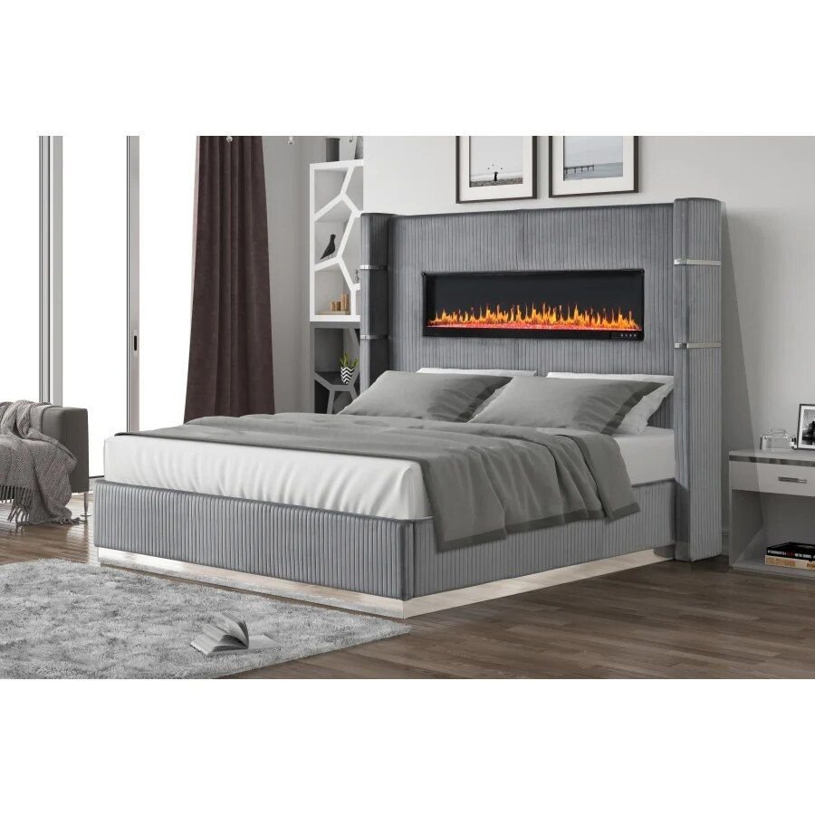 Elevate your bedroom with the Gray Velvet King Bed with Ambient Lighting, a perfect blend of luxury, comfort, and modern technology. This stunning bed features a plush gray velvet upholstery and a unique headboard with a fireplace display offering six color options, controlled remotely for a customizable ambiance. Equipped with USB ports and Bluetooth speakers, it allows you to charge your devices and enjoy music while relaxing. Ideal for creating a tranquil and luxurious retreat, this bed is a true statement piece in any modern bedroom.