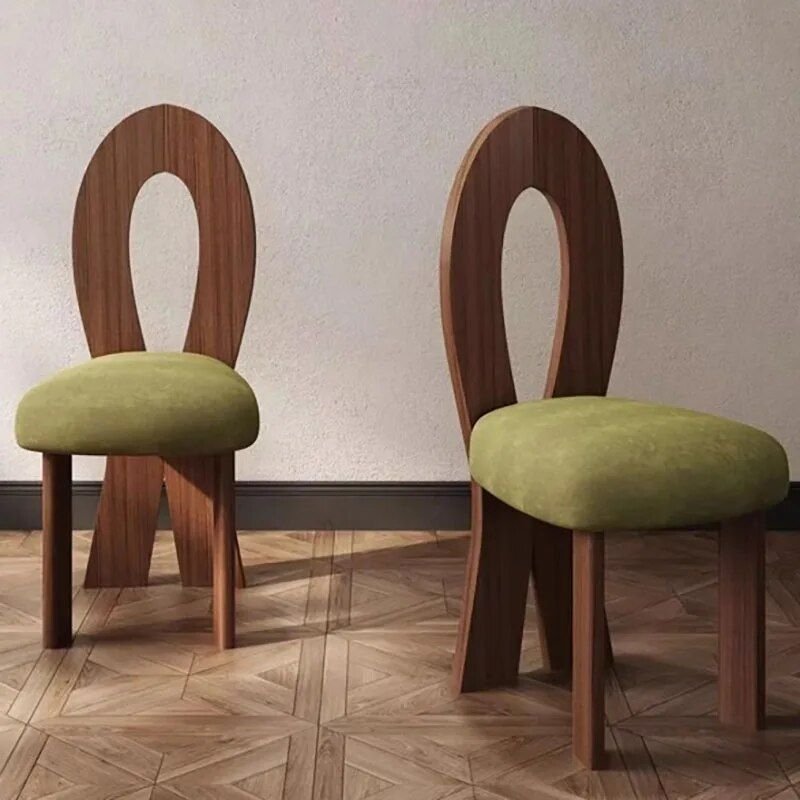Elevate your dining space with the Elegant European-Style Oak Dining Chair. Crafted from solid rubber wood, this chair combines Northern European charm with modern American design, offering both timeless elegance and lasting comfort. Its ergonomic design, comfortable upholstery, and master mortise and tenon construction ensure durability and a sophisticated aesthetic. Lightweight yet sturdy, this chair is perfect for everyday dining or special occasions, seamlessly fitting into both formal and casual settings. No assembly required—ready to enjoy right out of the box. Add a touch of luxury to your home with this stylish and practical piece.