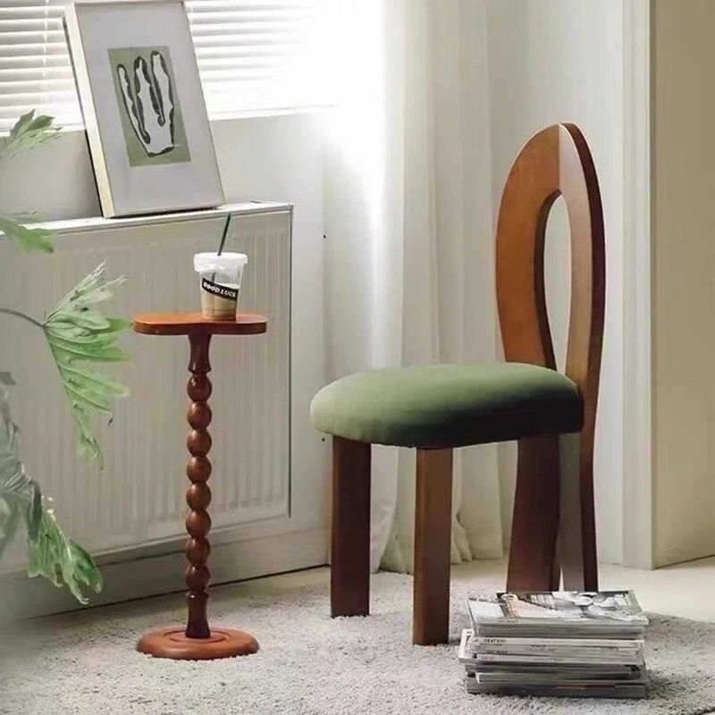 Elevate your dining space with the Elegant European-Style Oak Dining Chair. Crafted from solid rubber wood, this chair combines Northern European charm with modern American design, offering both timeless elegance and lasting comfort. Its ergonomic design, comfortable upholstery, and master mortise and tenon construction ensure durability and a sophisticated aesthetic. Lightweight yet sturdy, this chair is perfect for everyday dining or special occasions, seamlessly fitting into both formal and casual settings. No assembly required—ready to enjoy right out of the box. Add a touch of luxury to your home with this stylish and practical piece.