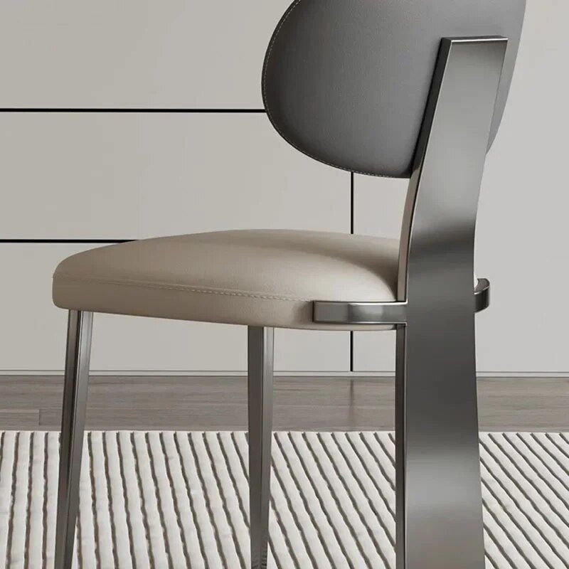 Elevate your space with the Luxury Minimalist Modern Dining Chair, a perfect blend of elegance and functionality. Designed with a sleek armless profile, this chair complements any contemporary décor while offering comfort and practicality. Crafted with sturdy metal construction, it ensures durability for both indoor and outdoor use. Ideal for dining rooms, kitchens, balconies, or salons, its minimalist style and foldable design make it versatile and easy to store. Add a touch of modern luxury to your home—this chair is the perfect choice for any sophisticated setting.