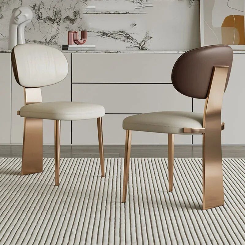 Elevate your space with the Luxury Minimalist Modern Dining Chair, a perfect blend of elegance and functionality. Designed with a sleek armless profile, this chair complements any contemporary décor while offering comfort and practicality. Crafted with sturdy metal construction, it ensures durability for both indoor and outdoor use. Ideal for dining rooms, kitchens, balconies, or salons, its minimalist style and foldable design make it versatile and easy to store. Add a touch of modern luxury to your home—this chair is the perfect choice for any sophisticated setting.