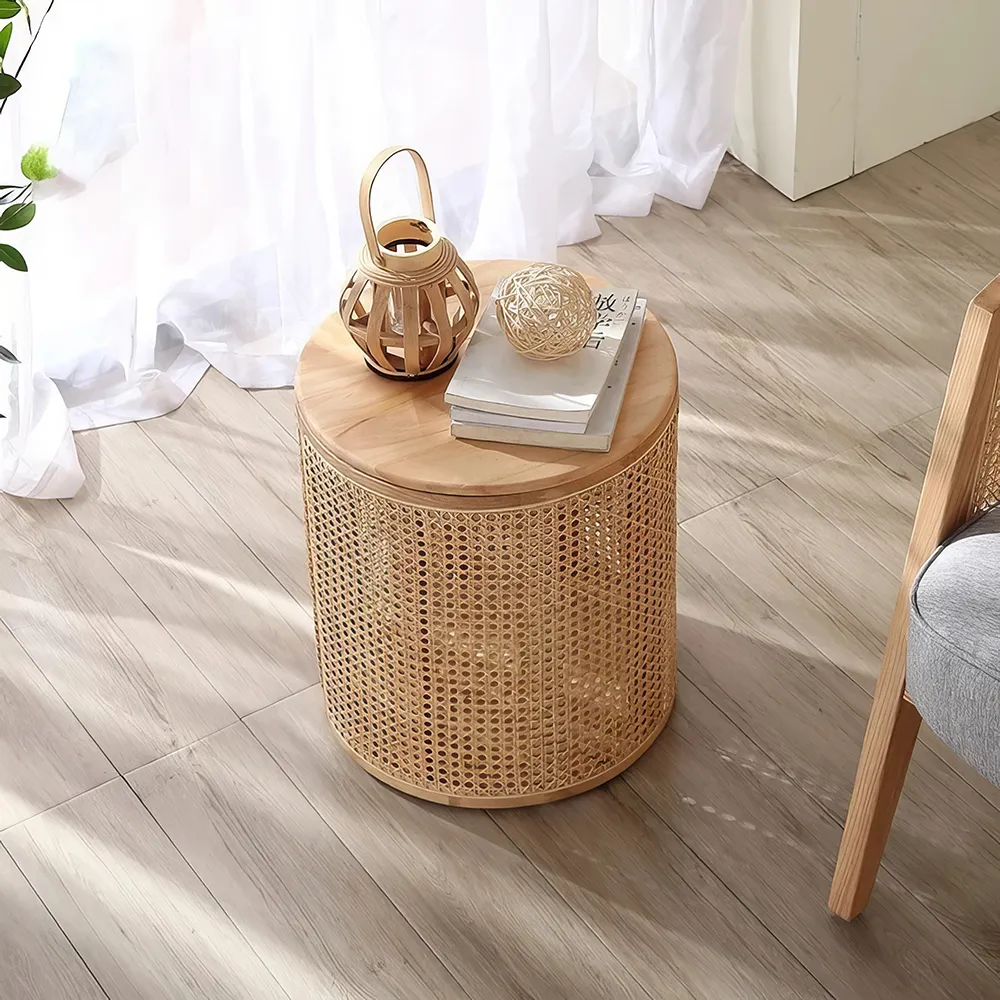 Elevate your home with the Round Rattan and Wood Coffee Table, a perfect fusion of modern Chinese aesthetics and practicality. Crafted with natural rattan and wood, this table celebrates the Wabi-Sabi philosophy with its simple, organic beauty and durable design. The round shape encourages social interaction, while the built-in storage keeps your space organized. Ideal for any living room, study, or bedroom, this versatile table offers a timeless blend of style and functionality, making it an elegant centerpiece for any home.
