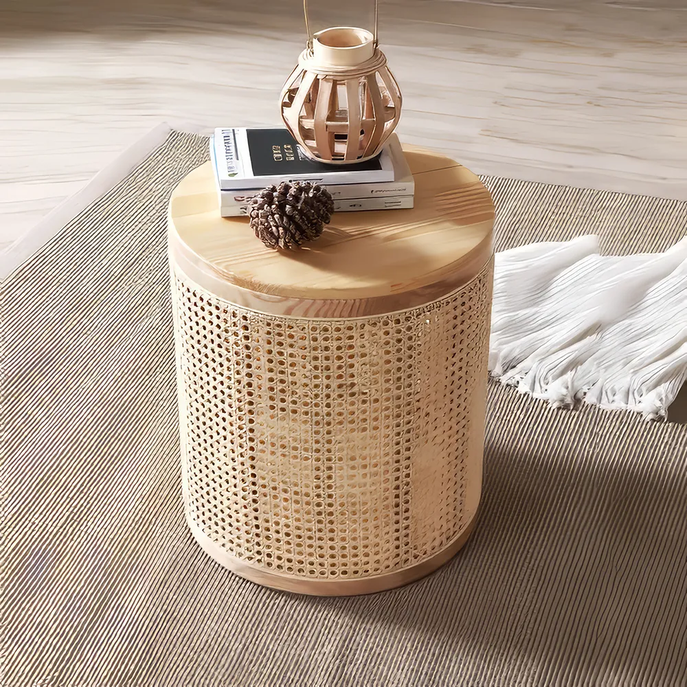 Elevate your home with the Round Rattan and Wood Coffee Table, a perfect fusion of modern Chinese aesthetics and practicality. Crafted with natural rattan and wood, this table celebrates the Wabi-Sabi philosophy with its simple, organic beauty and durable design. The round shape encourages social interaction, while the built-in storage keeps your space organized. Ideal for any living room, study, or bedroom, this versatile table offers a timeless blend of style and functionality, making it an elegant centerpiece for any home.