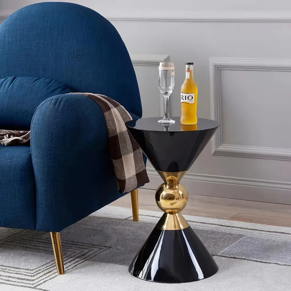 main-image-3-2-285 Introducing our Minimalist Modern Nordic Round Side Table, where elegance meets practicality. With its unique alien-shaped design and sleek, storage-free construction, this table adds a touch of contemporary sophistication to any space. Its sturdy, non-retractable structure ensures stability, while the minimalist aesthetic complements modern interiors. Easy to assemble and versatile, this table is perfect for small spaces and ideal for displaying decorative items or holding everyday essentials. Bring home this statement piece for a stylish, clutter-free living room.