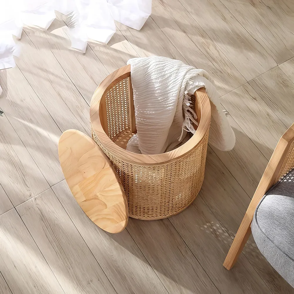 Elevate your home with the Round Rattan and Wood Coffee Table, a perfect fusion of modern Chinese aesthetics and practicality. Crafted with natural rattan and wood, this table celebrates the Wabi-Sabi philosophy with its simple, organic beauty and durable design. The round shape encourages social interaction, while the built-in storage keeps your space organized. Ideal for any living room, study, or bedroom, this versatile table offers a timeless blend of style and functionality, making it an elegant centerpiece for any home.