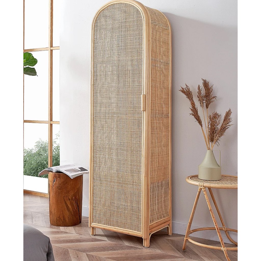 Introducing our Modern Rattan Wardrobe, a sophisticated blend of natural beauty and functionality. Crafted from high-quality plant rattan, this compact wardrobe features a single vertical hinged door for easy access and space efficiency. Perfect for small bedrooms, homestays, or apartments, it offers a seamless fit into modern interiors while providing sturdy, reliable storage. Fully assembled for your convenience, this wardrobe brings both style and practicality to your home with its elegant design and durable construction. Transform your space today with this stylish, functional piece!