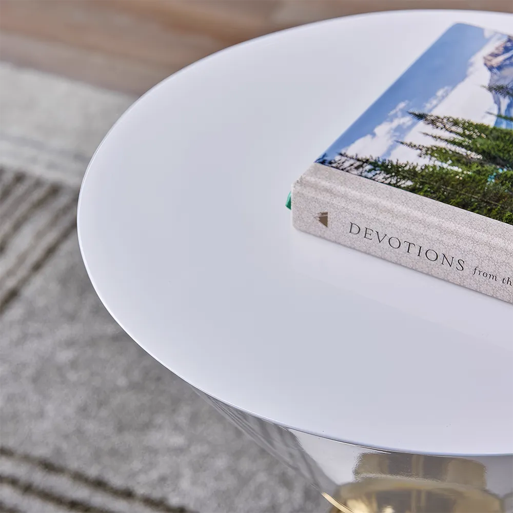 o1cn01399g2v2hq065g1eo7-1971839144-2-4 Introducing our Minimalist Modern Nordic Round Side Table, where elegance meets practicality. With its unique alien-shaped design and sleek, storage-free construction, this table adds a touch of contemporary sophistication to any space. Its sturdy, non-retractable structure ensures stability, while the minimalist aesthetic complements modern interiors. Easy to assemble and versatile, this table is perfect for small spaces and ideal for displaying decorative items or holding everyday essentials. Bring home this statement piece for a stylish, clutter-free living room.