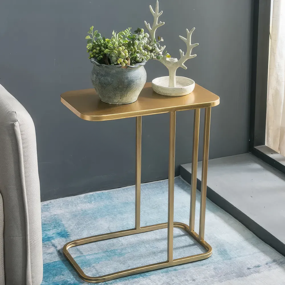 Introducing the Luxe Marble-Top Iron Side Table, a perfect fusion of modern minimalism and luxury. With a premium iron frame and a stunning marble top, this table adds a sophisticated, contemporary flair to any space. Its geometric design, radiant gold finish, and sleek rectangular shape make it a statement piece that enhances your decor without overwhelming it. Ideal for displaying decor, holding drinks, or as an accent in your living room or office, this table combines function with timeless elegance. Elevate your space today with this luxurious addition to your home.