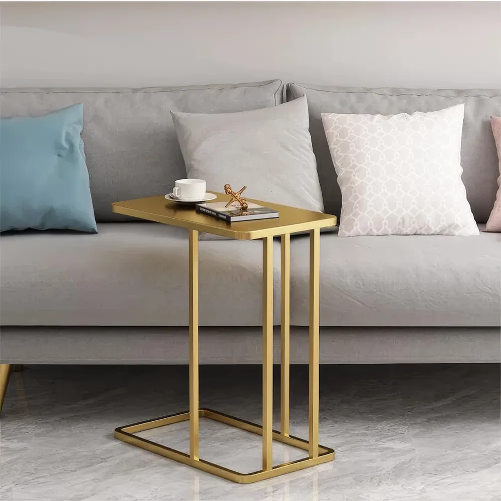 Introducing the Luxe Marble-Top Iron Side Table, a perfect fusion of modern minimalism and luxury. With a premium iron frame and a stunning marble top, this table adds a sophisticated, contemporary flair to any space. Its geometric design, radiant gold finish, and sleek rectangular shape make it a statement piece that enhances your decor without overwhelming it. Ideal for displaying decor, holding drinks, or as an accent in your living room or office, this table combines function with timeless elegance. Elevate your space today with this luxurious addition to your home.
